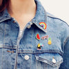 Why you should add enamel pins to your wardrobe